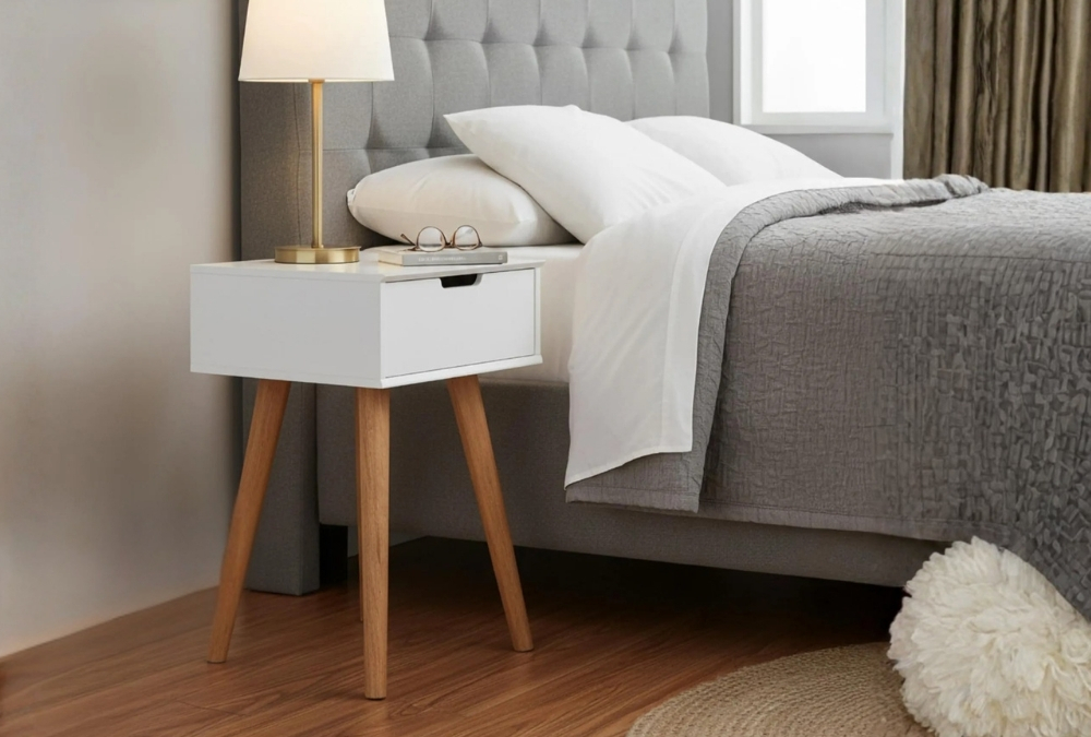 Mitra White and Oak 1 Drawer Bedside Table beside a small bed